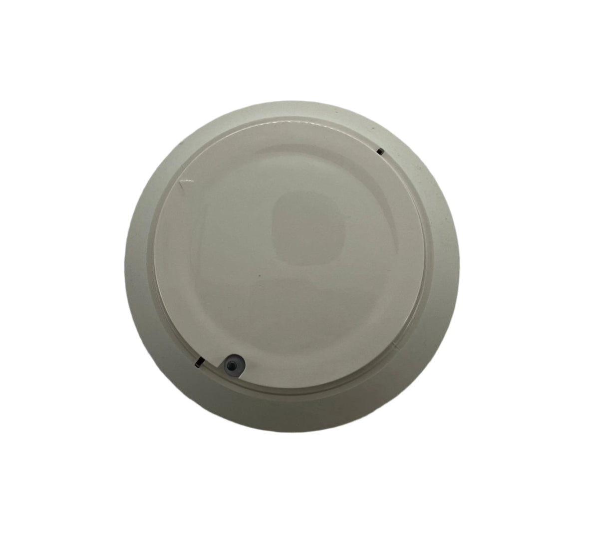 Farenhyt IDP-FIRE-CO-IV fire and carbon monoxide detector mounted on ceiling, showcasing its compact design and alert indicator lights.
