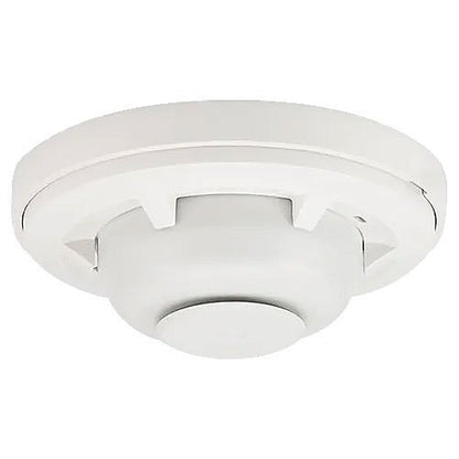 System Sensor 5601P heat detector with fixed temperature and rate-of-rise sensor, shown in a close-up view.