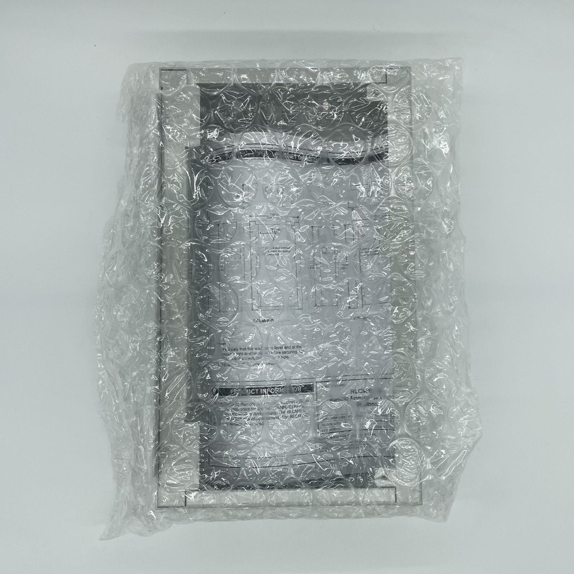 Edwards RLCM/B-S replacement part installed in a surface wall box, used for industrial or electrical systems.
