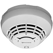 Edwards SIGA-OSD Signature Series optical smoke detector mounted on ceiling, designed for fire safety and smoke detection.