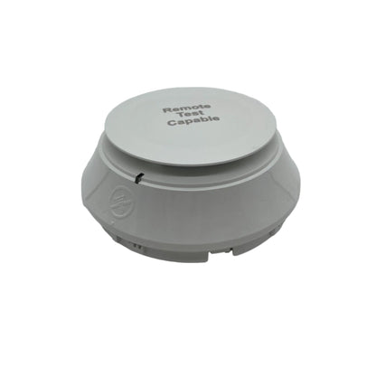 Notifier FSP-951R FlashScan remote test photoelectric smoke detector with test cap, mounted on ceiling for fire safety detection.