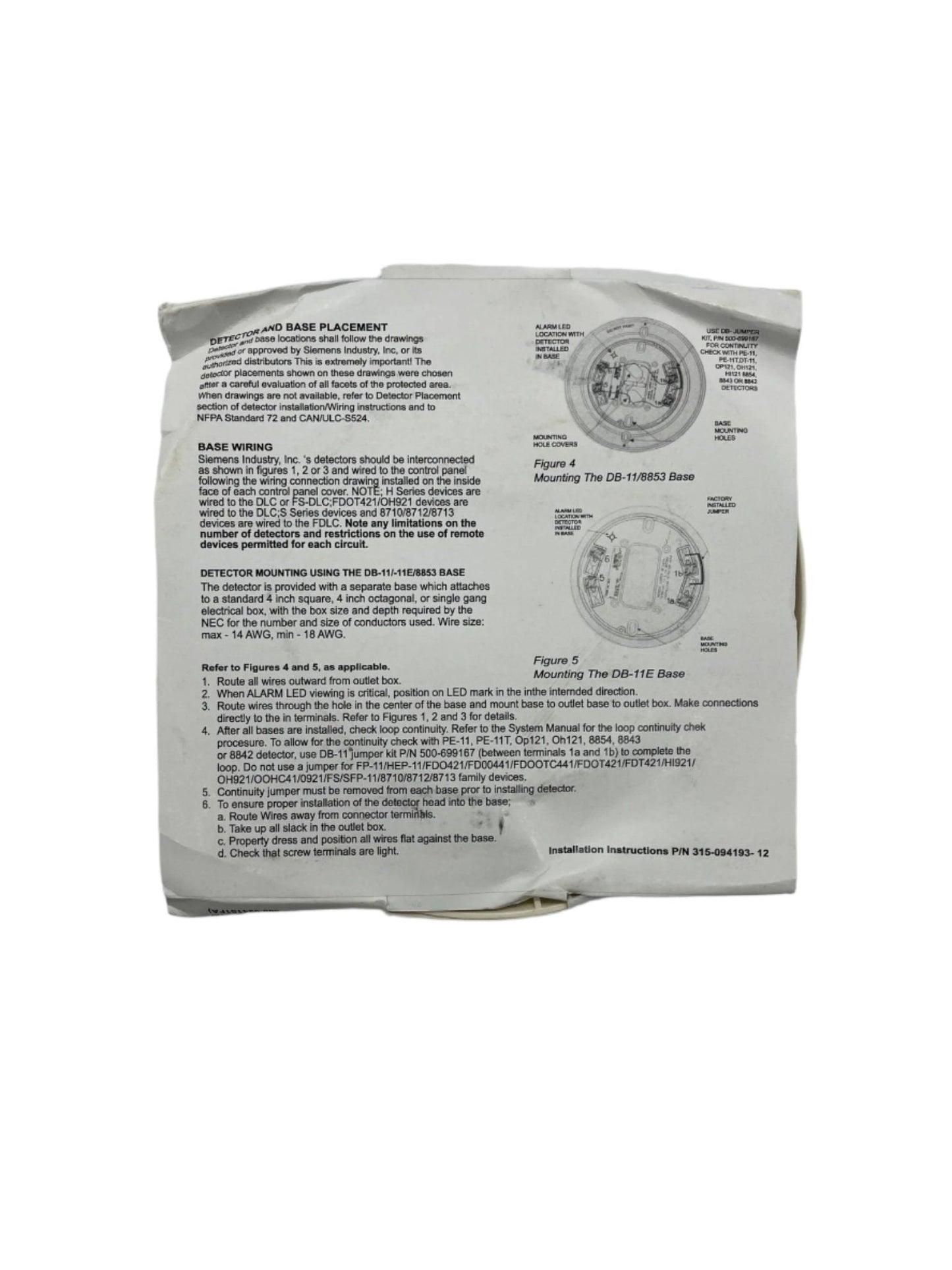 Siemens DB-11 detector base, low-profile surface-mount base for fire alarm systems, shown in a close-up view.