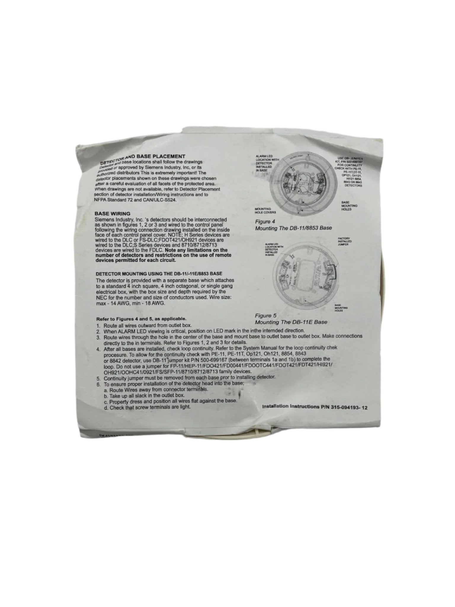 Siemens DB-11 detector base, low-profile surface-mount base for fire alarm systems, shown in a close-up view.