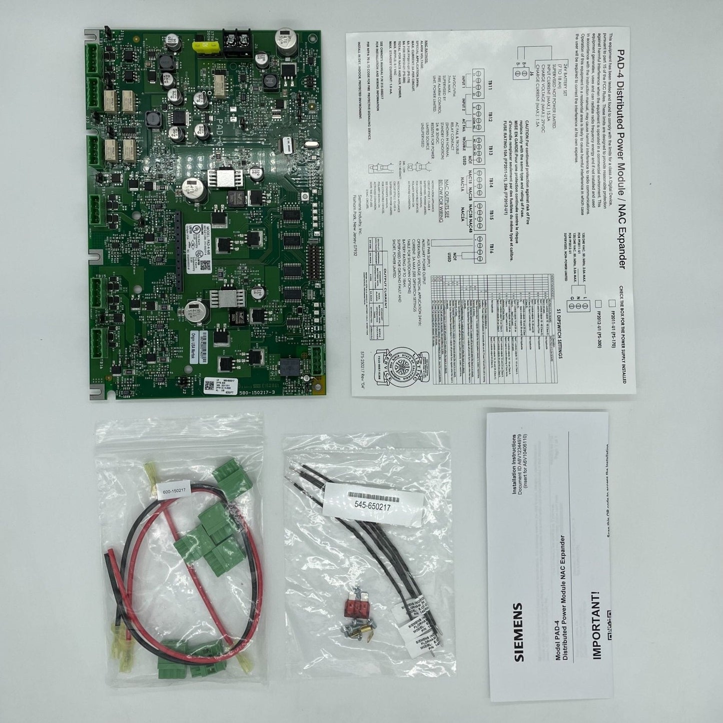 Siemens Cerberus PRO PAD-4-MB panel card, interface board for fire alarm system, with various ports and connectors visible.