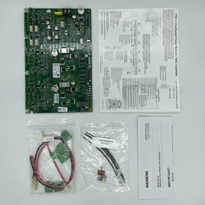Siemens Cerberus PRO PAD-4-MB panel card, interface board for fire alarm system, with various ports and connectors visible.