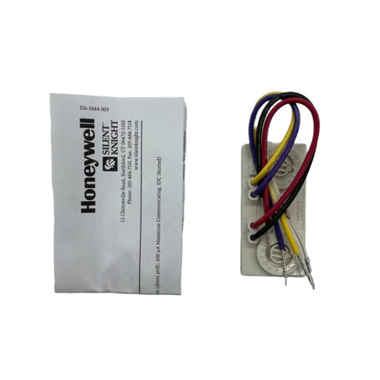 Silent Knight SK-MINIMON addressable monitor module for fire alarm systems, compact device with status indicators.