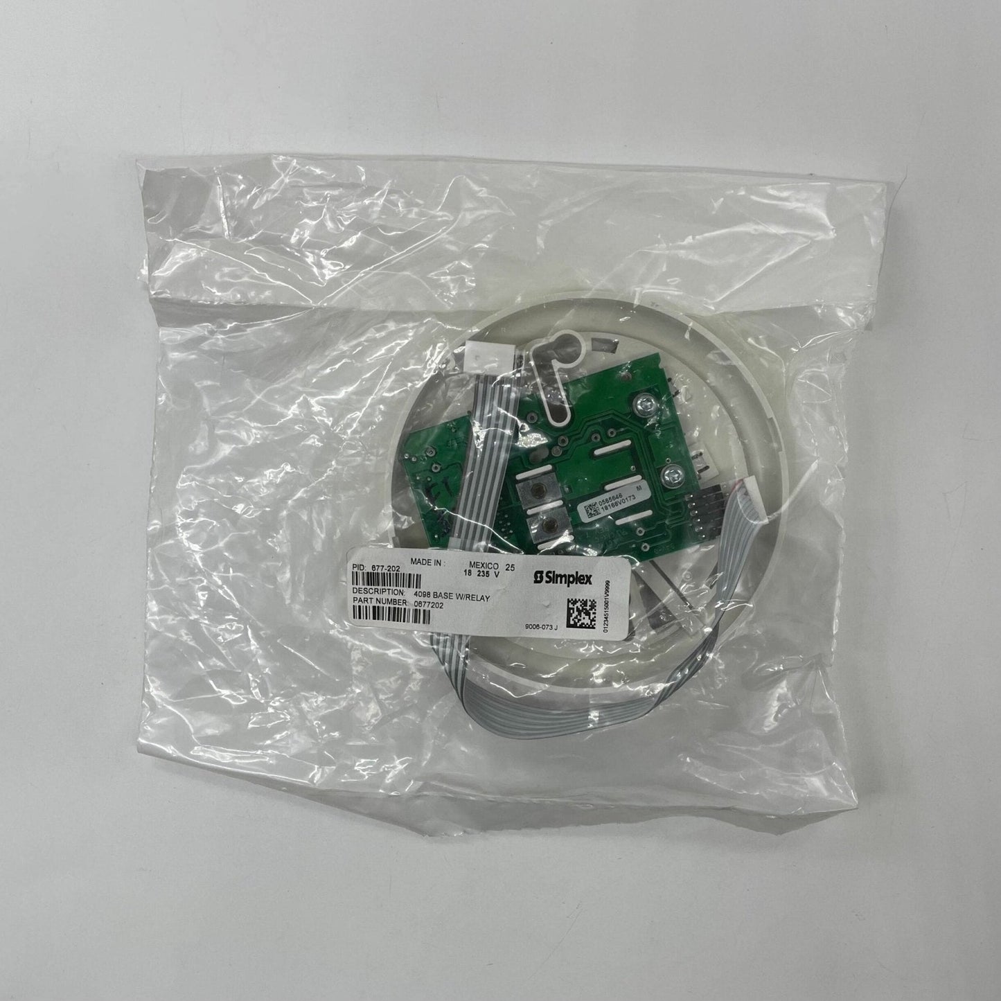 Simplex 677-202 Legacy Interface Module for Fire Alarm Panels, showing the replacement module with relay on a white background.