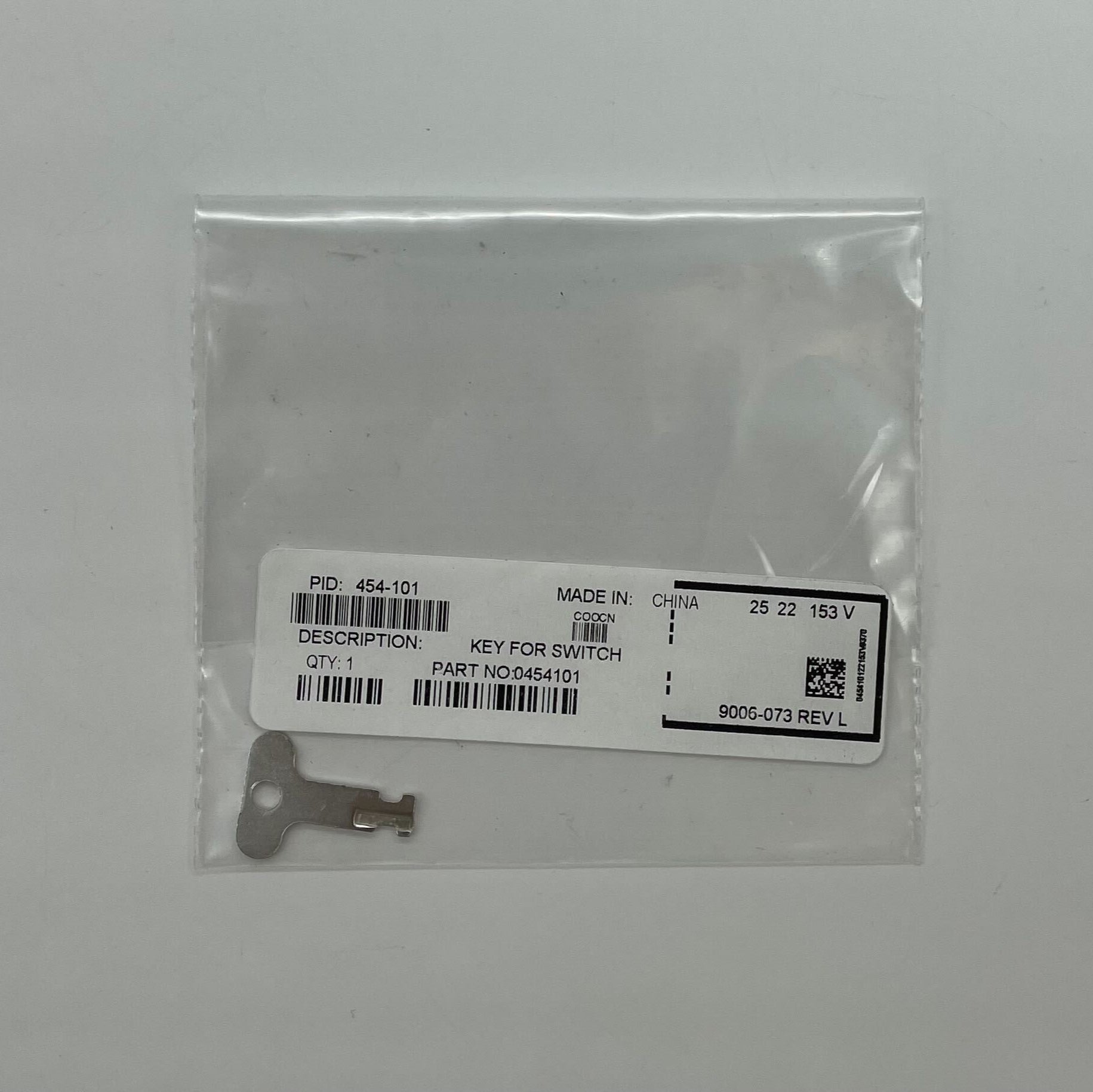 Simplex 454-101 Legacy Module key for fire alarm panel replacement, featuring a black plastic key with the Simplex branding.