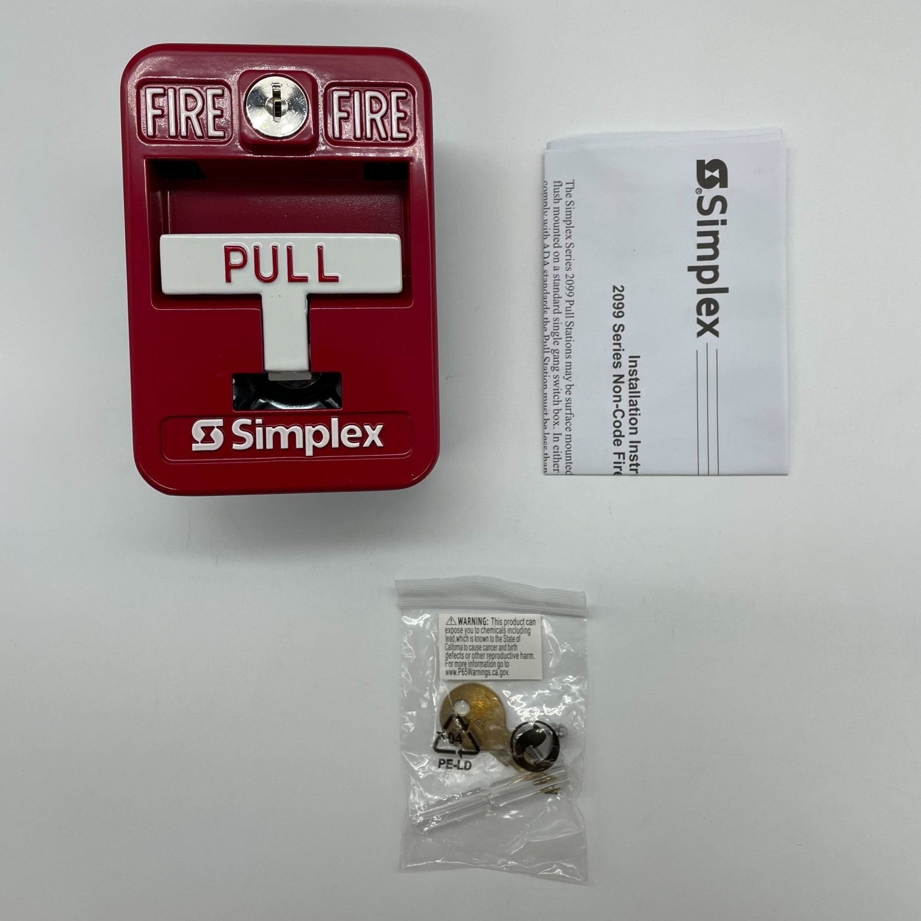 Simplex 2099-9138 pull station, non-coded manual fire alarm station with single-action design, mounted on wall.