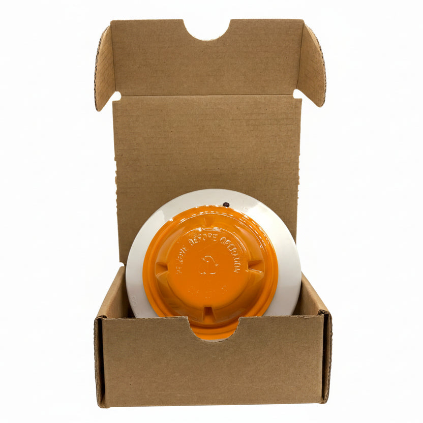 System Sensor 2151 low-profile photoelectric smoke detector mounted on ceiling for fire safety.